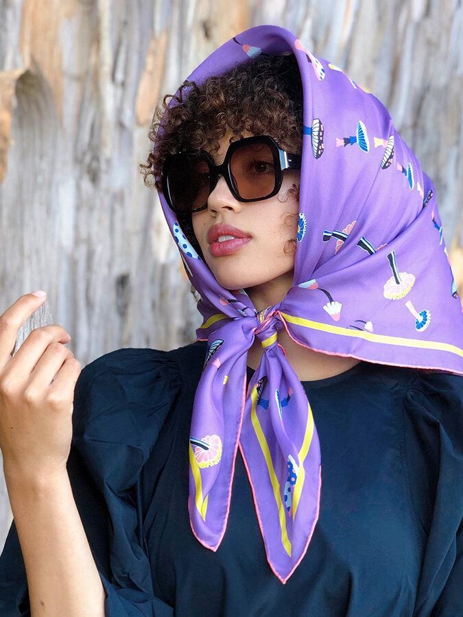 Woman wearing silk scarf